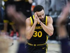 开云体育中国-勇士小胜马刺，库里关键时刻发威